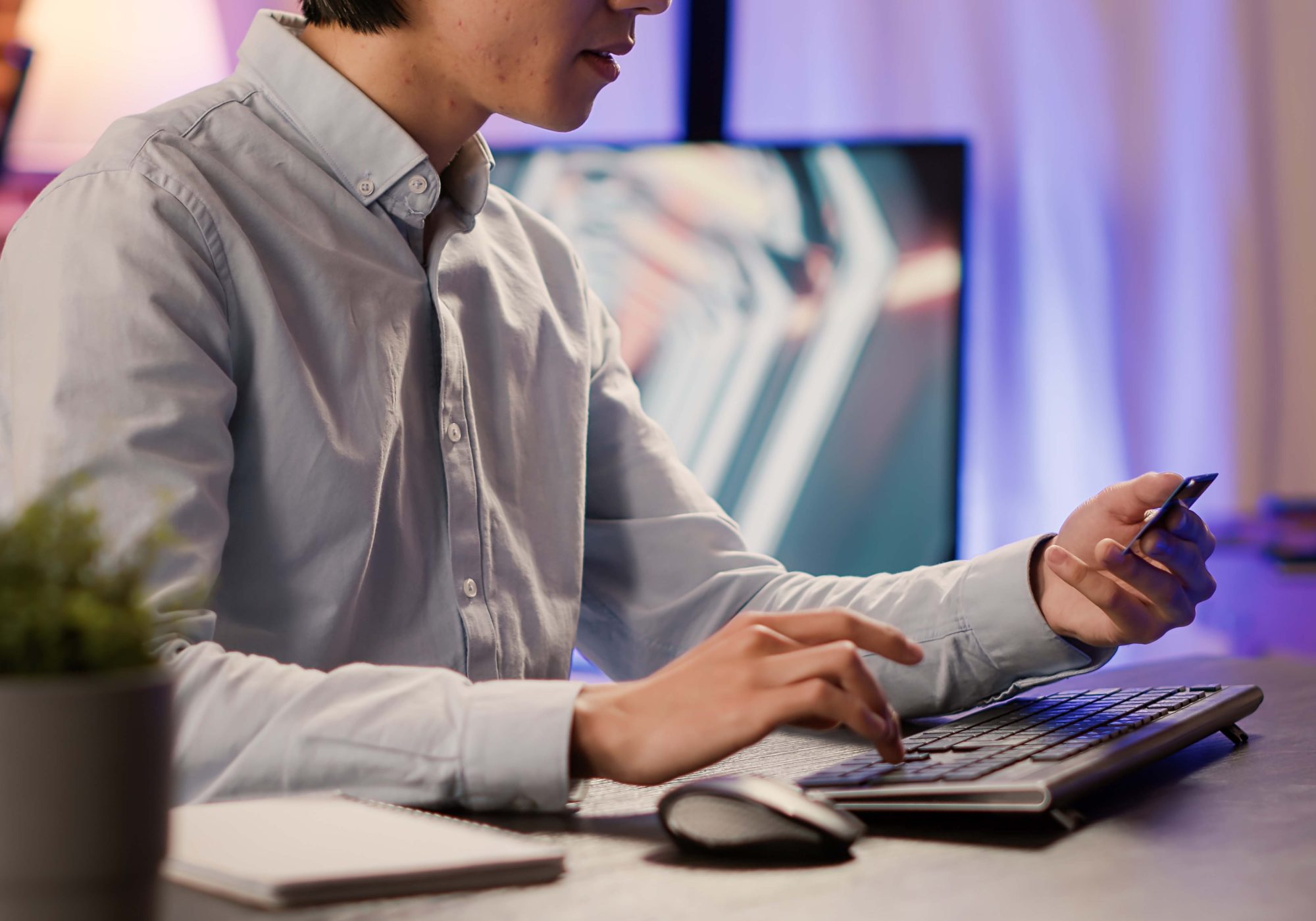 Entrepreneur doing online shopping with credit card on computer, making discount purchase with banking transaction. Buying from retail store website to order on sale, electronic currency.