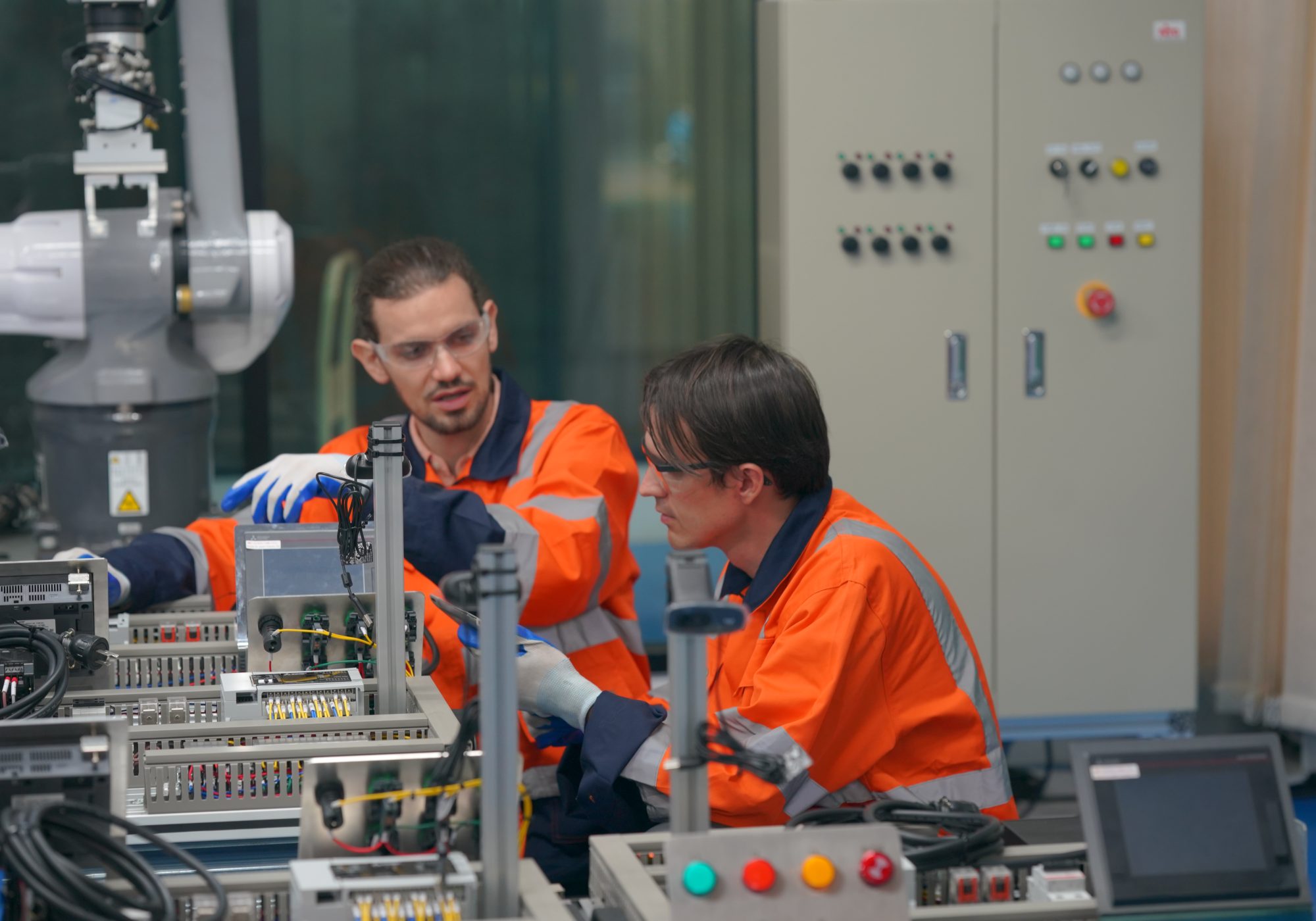 robotic-arm-engineer-check-on-equipment-in-its-wit-2023-03-07-19-09-55-utc